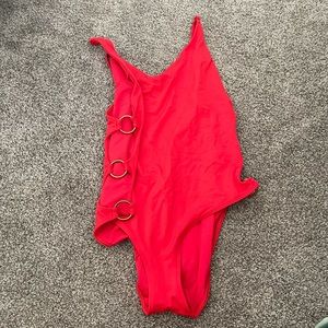 Aerie red one piece with holes in the side! Large